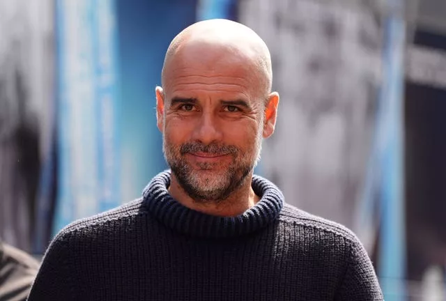 Manchester City manager Pep Guardiola arrives ahead of the Premier League match at Craven Cottage