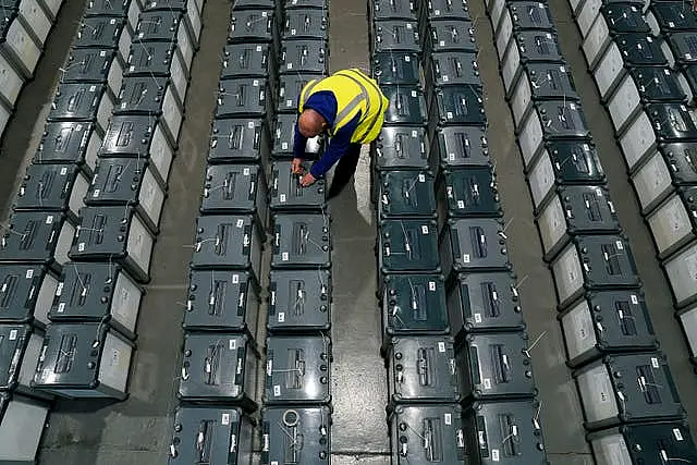 Ballot boxes being prepared for the election in a warehouse