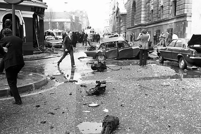 Wrecked cars and debris at the scene after the Old Bailey bomb explosion in London