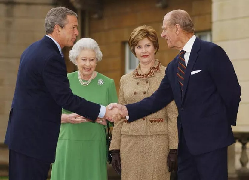 George Bush shakes hands with the Duke of Edinburgh