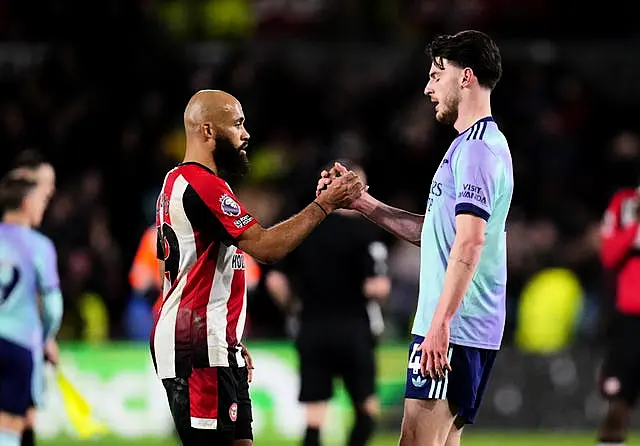 Declan Rice and Bryan Mbeumo shake hands