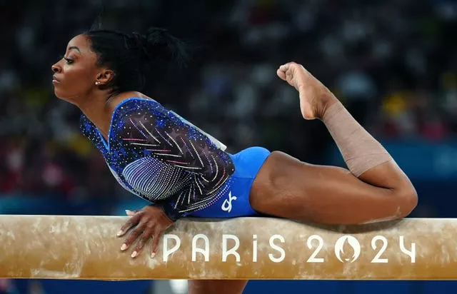 Biles on the beam