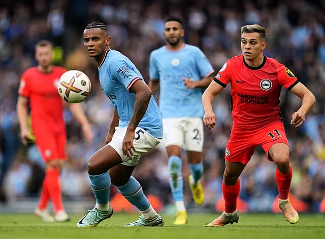 Manuel Akanji (left) and Leandro Trossard (right)