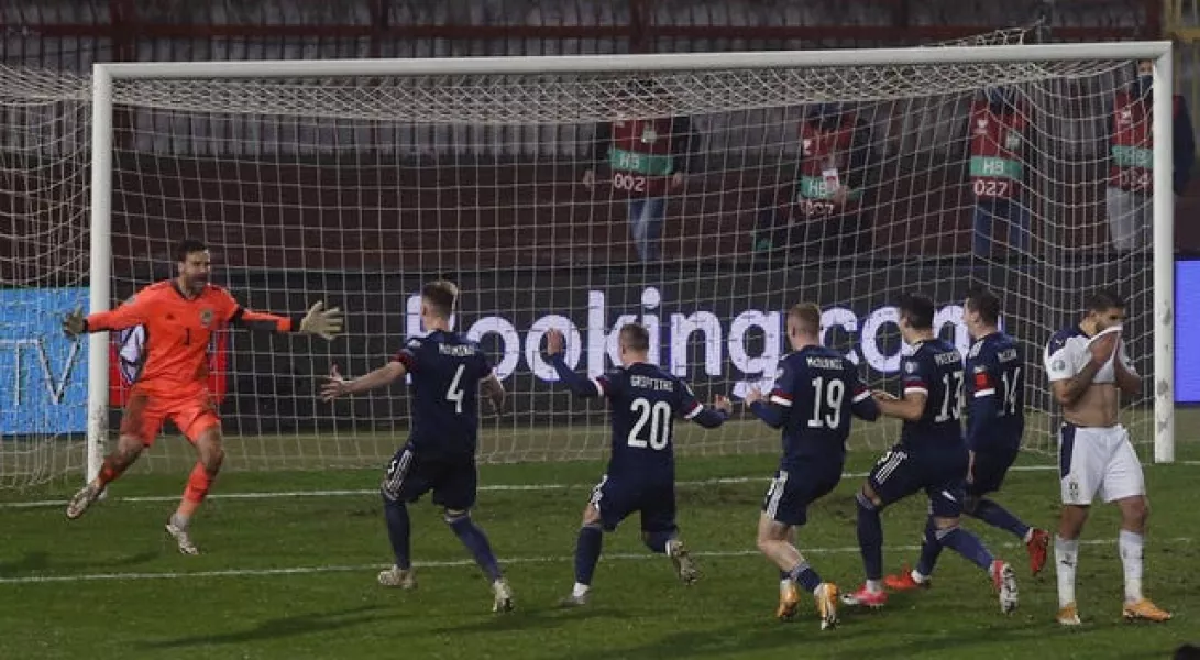 David Marshall celebrates saving from Serbia’s Aleksandar Mitrovic 