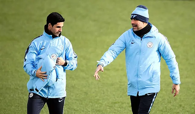 Manchester City manager Pep Guardiola (right) and assistant Arteta formed a successful partnership.