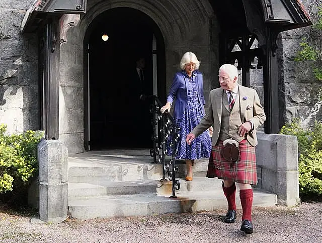 The King and Queen leave Crathie Parish Church, near Balmoral, after a church service, to mark the first anniversary of the death of Queen Elizabeth II