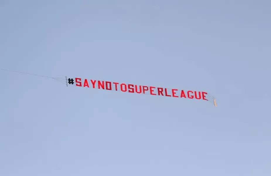 A plane with a ‘Say No To Super League’ banner flies over Elland Road