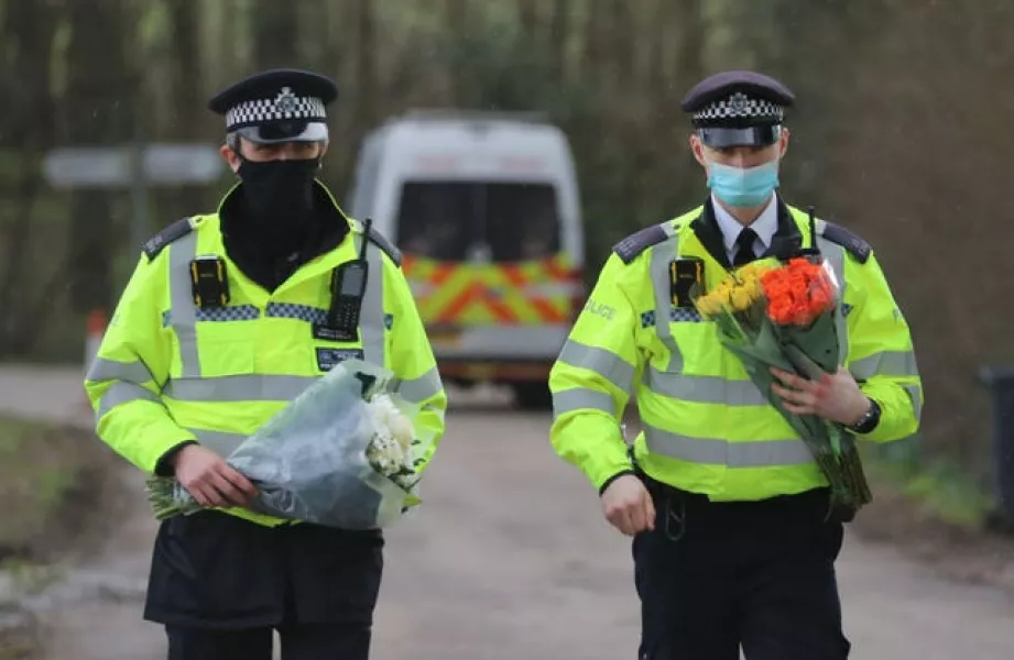 Officers collect tributes to Sarah Everard