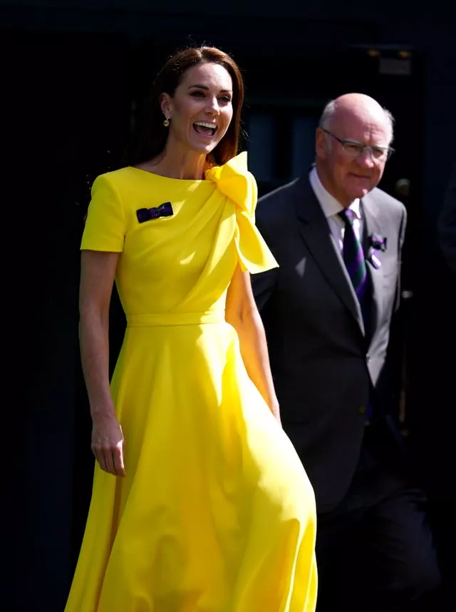 The Duchess of Cambridge on centre court following the presentation on day thirteen of the 2022 Wimbledon Championships at the All England Lawn Tennis and Croquet Club, Wimbledon 