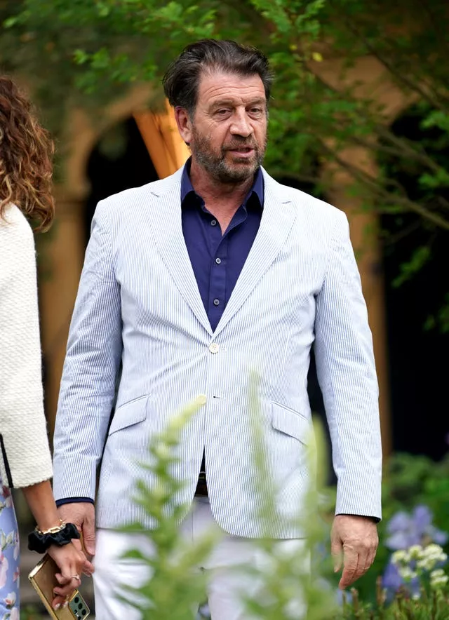 Nick Knowles in white suit at the Chelsea Flower Show 2022