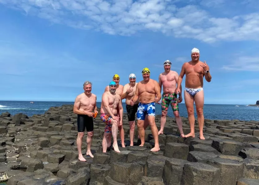 Tánaiste among swimmers braving freezing waters for New Year's Day swim
