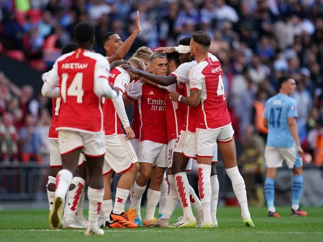Arsenal celebrate their late equaliser against Manchester City in Sunday's Community Shield
