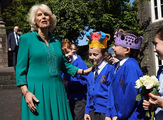 The Queen meets Camilla Nowawakowska and Charles Murray