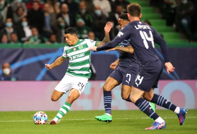Sporting right-back Pedro Porro (left) appears poised to join Spurs