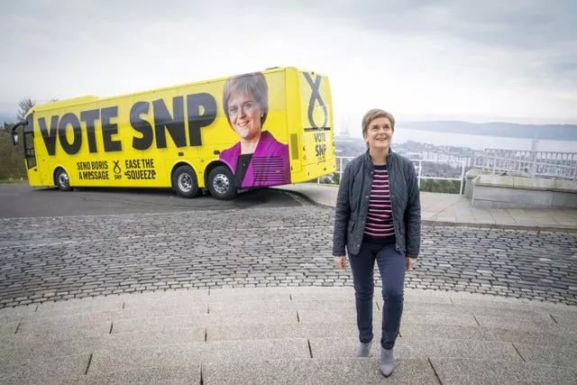 Nicola Sturgeon with SNP campaign bus