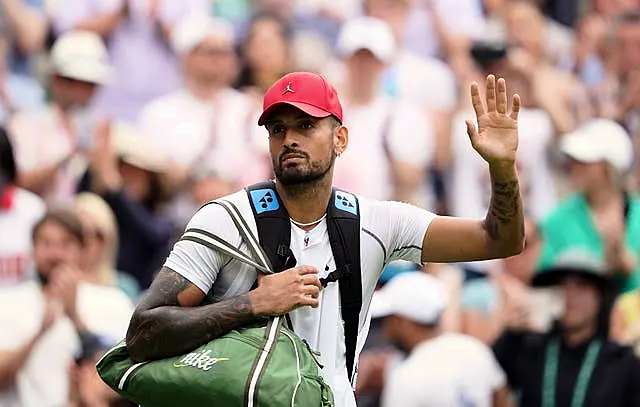 Nick Kyrgios waves to the Centre Court crowd after his victory