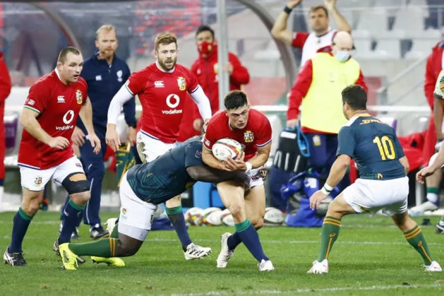 Louis Rees-Zammit is tackled by Trevor Nyakane