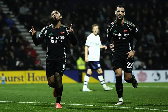 Gabriel Jesus, left, celebrates his goal