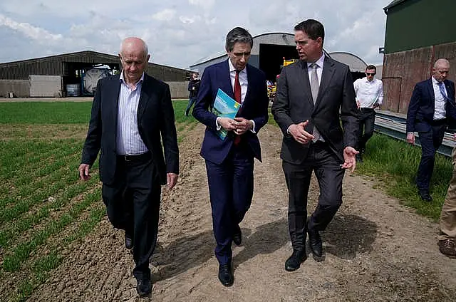 Taoiseach Simon Harris, centre,