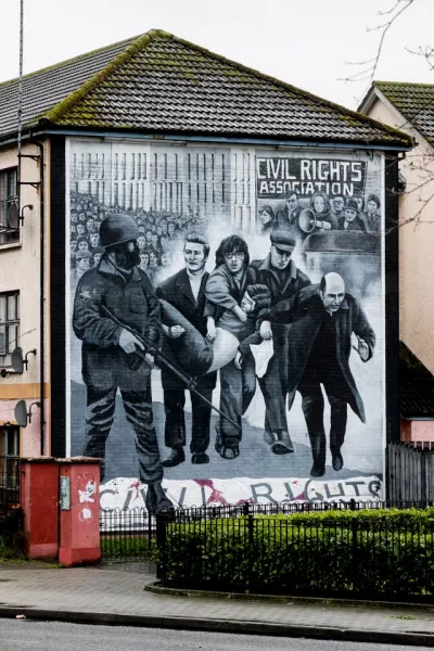 Bloody Sunday Bogside mural showing a white handkerchief being waved by Fr Edward Daly as the body of Jackie Duddy was carried from where he was shot in the courtyard of Rossville Flats (Liam McBurney/PA)