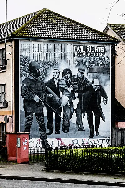 Bloody Sunday Bogside mural showing a white handkerchief being waved by Fr Edward Daly as the body of Jackie Duddy was carried from where he was shot in the courtyard of Rossville Flats (Liam McBurney/PA)