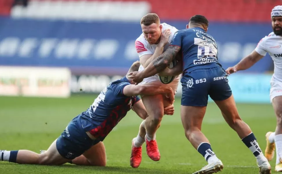 Exeter Chiefs’ Sam Simmonds (centre) is tackled by Bristol Bears’ Sam Bedlow and Charles Piutau during his side's 20-12 win over the Gallagher Premiership leaders