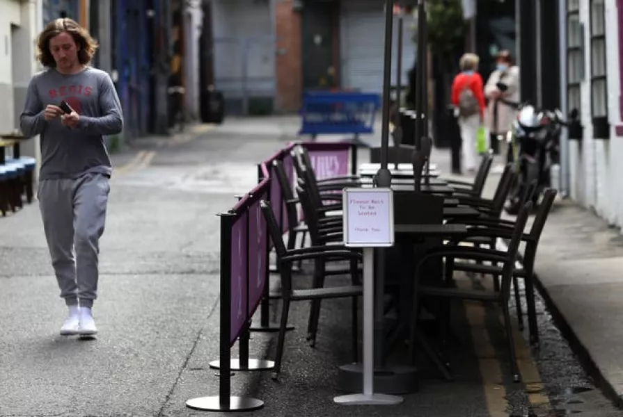 A sign for seating at a restaurant in Dublin’s city centre (Brian Lawless/PA)