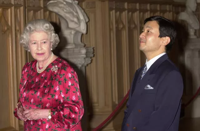 The Queen with the Crown Prince Naruhito of Japan - now Emperor - in St George’s Hall in Windsor Castle in 2001