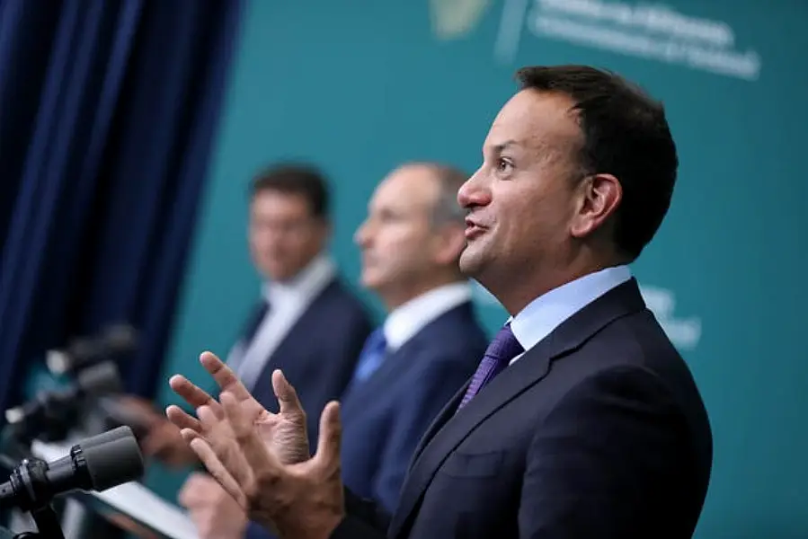 Eamon Ryan Minister for the Environment Climate and Communications, Taoiseach Michael Martin and Tanaiste Leo Varadkar (Julien Behal/PA)