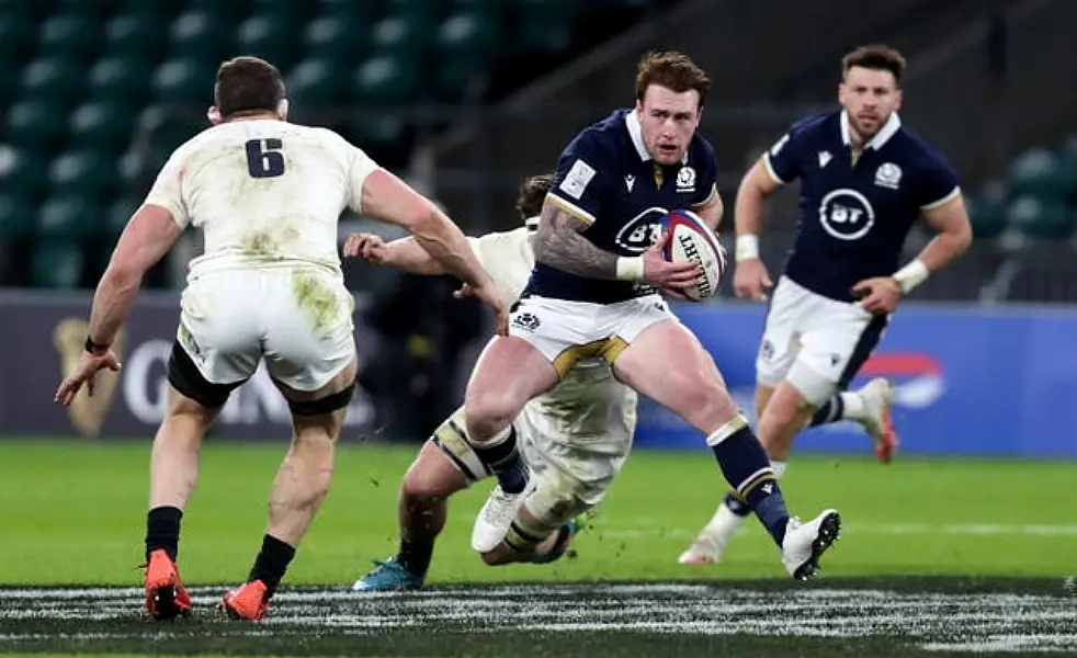 Scotland’s Stuart Hogg breaks past England’s Mark Wilson