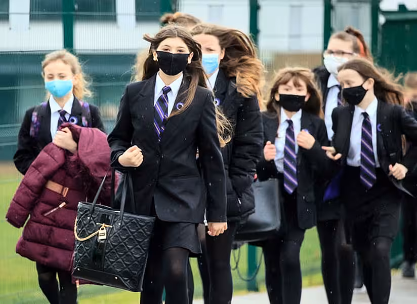 Face coverings are already recommended in communal areas (Danny Lawson/PA)