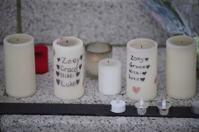 Candles among the tributes left at Kickham Plaza