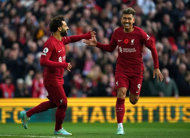Roberto Firmino (right) and Mohamed Salad celebrate