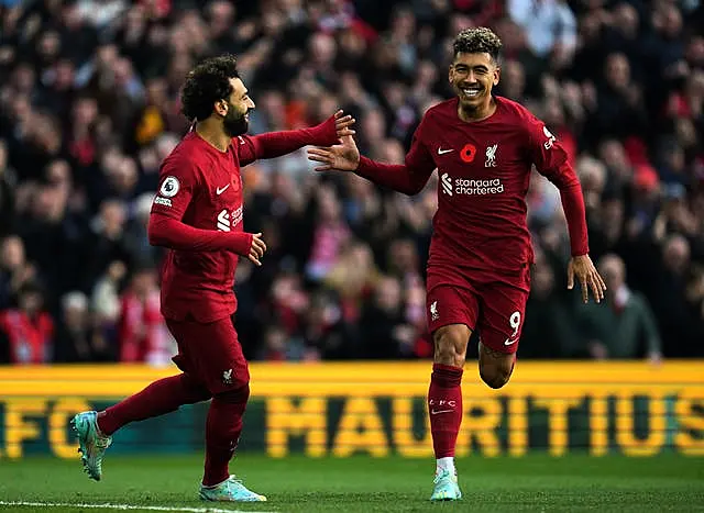 Roberto Firmino (right) and Mohamed Salad celebrate