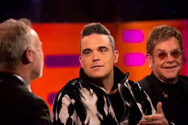 Sir Elton John with Robbie Williams