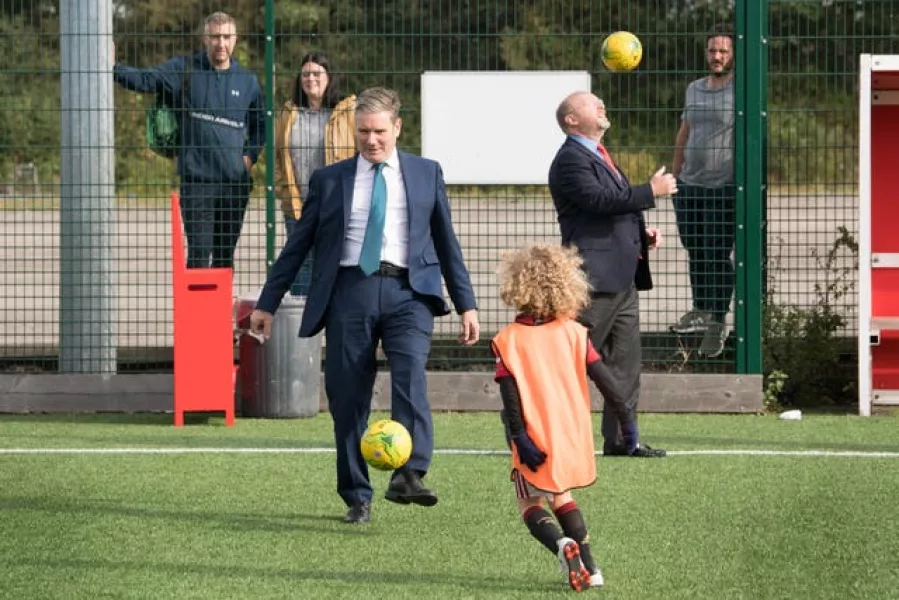 Labour leader Sir Keir Starmer (left) was able to return to work and even play football in the evening following his ambush by demonstrators