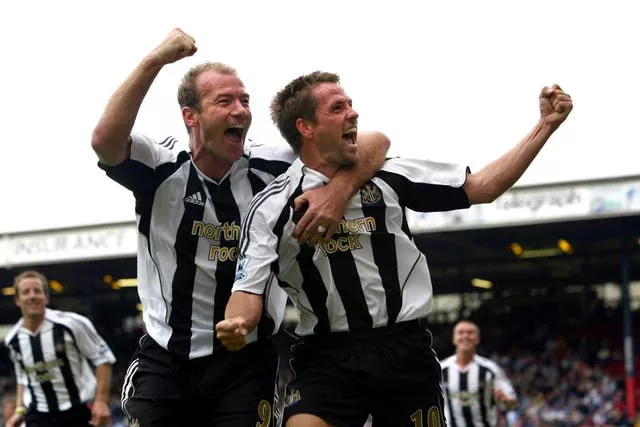 Michael Owen, right, celebrates a Newcastle goal with Alan Shearer