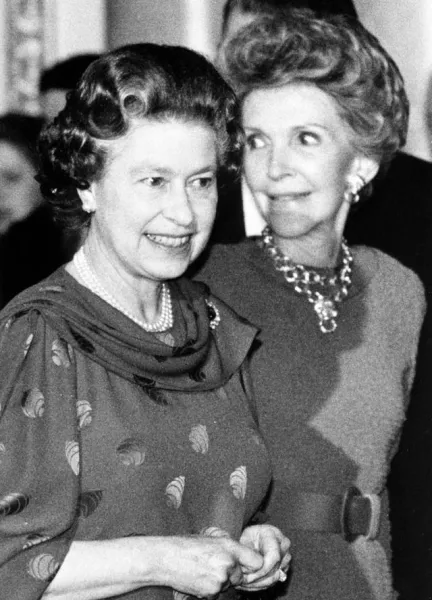 The Queen with then US first lady Nancy Reagan (PA)