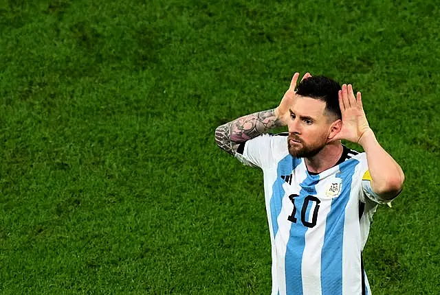 Lionel Messi celebrates after scoring Argentina's second 