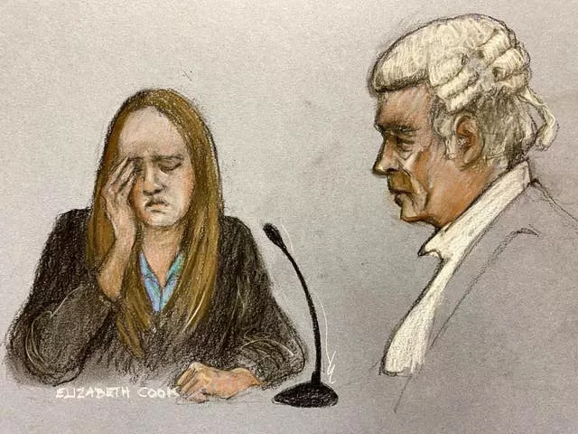 Court artist sketch by Elizabeth Cook of Lucy Letby reacting to the final questions from her barrister Ben Myers, as she appears in the dock at Manchester Crown Court 