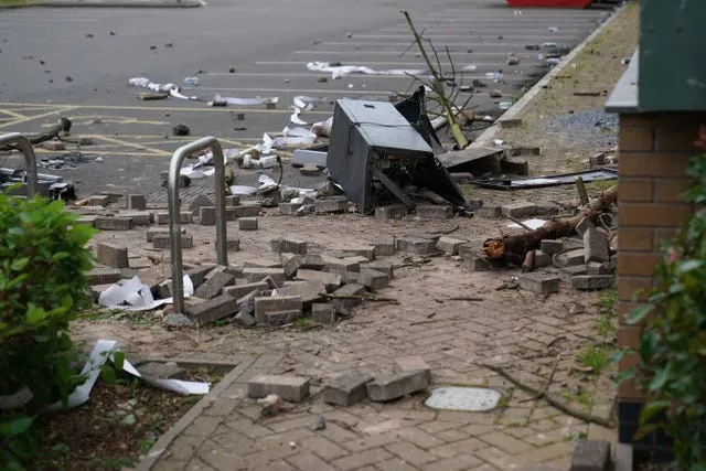 Damage at the Holiday Inn Express in Tamworth, Staffordshire, after a mob attacked it on Sunday 