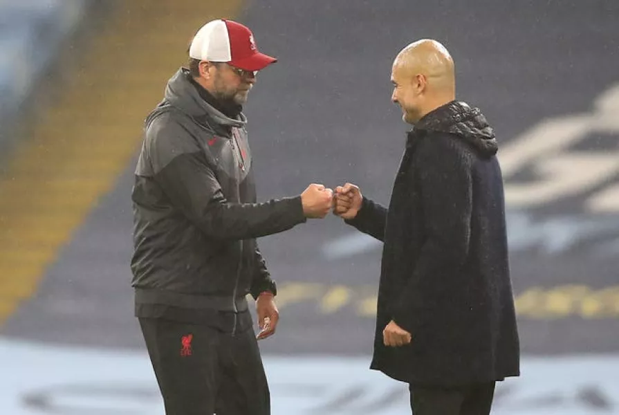 Klopp (left) and Guardiola (right) have a healthy rivalry