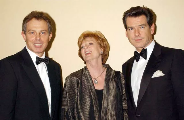 Dame Maggie Smith with then PM Tony Blair and Pierce Brosnan