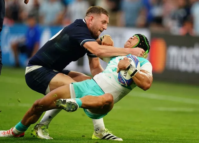 Robbie Henshaw, not pictured, is wary of the threat posed by Scotland fly-half Finn Russell, left