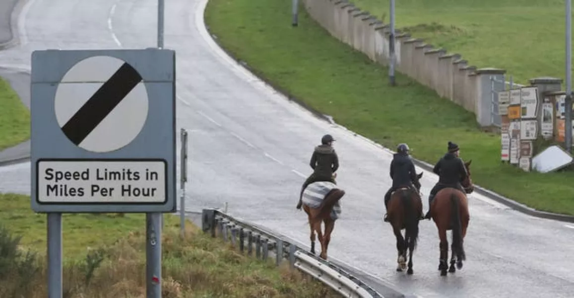 A group of horse riders crosses the border from the Republic of Ireland into Northern Ireland at Carrickcarnan in Co Louth (Niall Carson/PA)