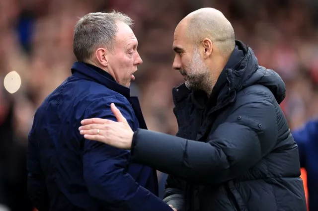 Manchester City manager Pep Guardiola and Nottingham Forest boss Steve Cooper