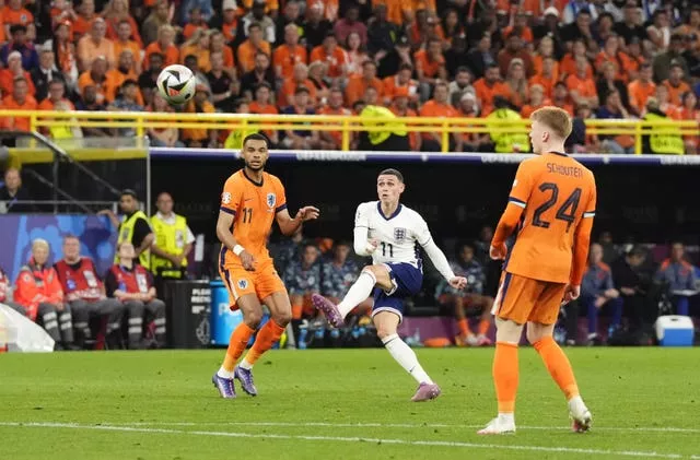 Phil Foden strikes towards goal against the Netherlands