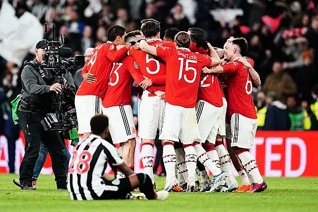 Manchester United's players celebrate victory over Newcastle in the 2023 Carabao Cup final