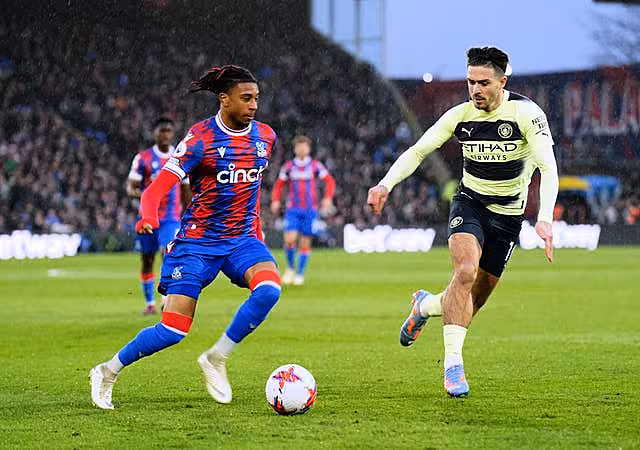 Crystal Palace’s Michael Olise (left) and Manchester City’s Jack Grealish (Zac Goodwin/PA)