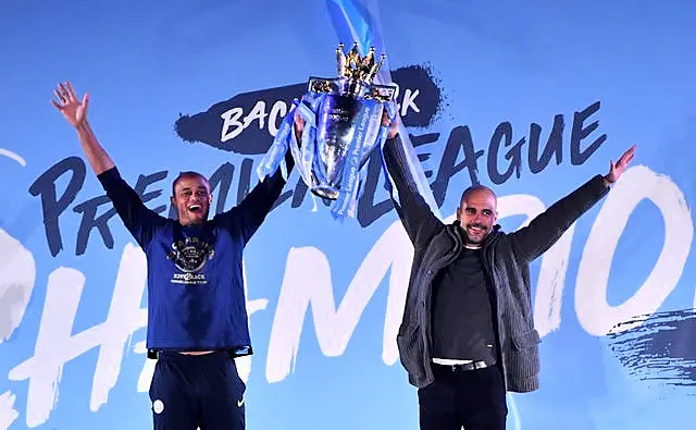 Vincent Kompany, left, and manager Pep Guardiola